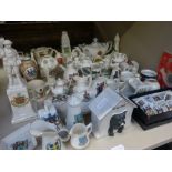 A selection of crested ware, various including Kendal War Memorial