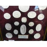 A framed collection of 19th century wafer seals impressed as Medallions