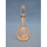 A cut glass perfume bottle having a cut glass stopper and silver collar, Birmingham 1919, Arthur