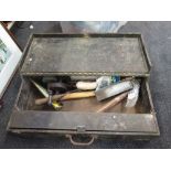 A vintage tool box and contents