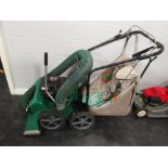 A Billygoat 5.5hp self-propelled lawn vacuum