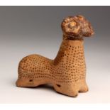 An Etruscan-Corinthian pottery figural unguentarium in the shape of a ram End of 7th - early 6th