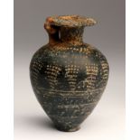 An Etruscan bucchero ware aryballos 7th century BC; 8,2 cm (3,22 in) high; Decorated with dots on