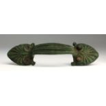 An Etruscan bronze cista handle 4th century BC; 18 cm (7,08 in) long; The handle-plates