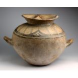 A Daunian bichrome pottery olla 550-400 BC; 31,5 cm (12,40 in) high; High everted rim, large