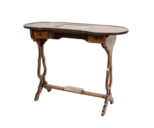 A KIDNEY SHAPED OCCASIONAL TABLE, the mo