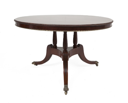 AN IRISH REGENCY MAHOGANY SUPPER TABLE,