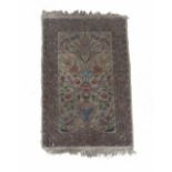 A SMALL PERSIAN WOOL RUG, the central fi