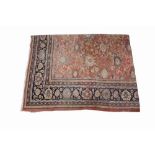 A SEMI ANTIQUE TABRIZ STYLE WOOL CARPET,