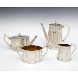 A VICTORIAN FOUR-PIECE SILVER TEA AND CO