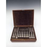 A SET OF TWELVE EARLY 19TH CENTURY SILVE