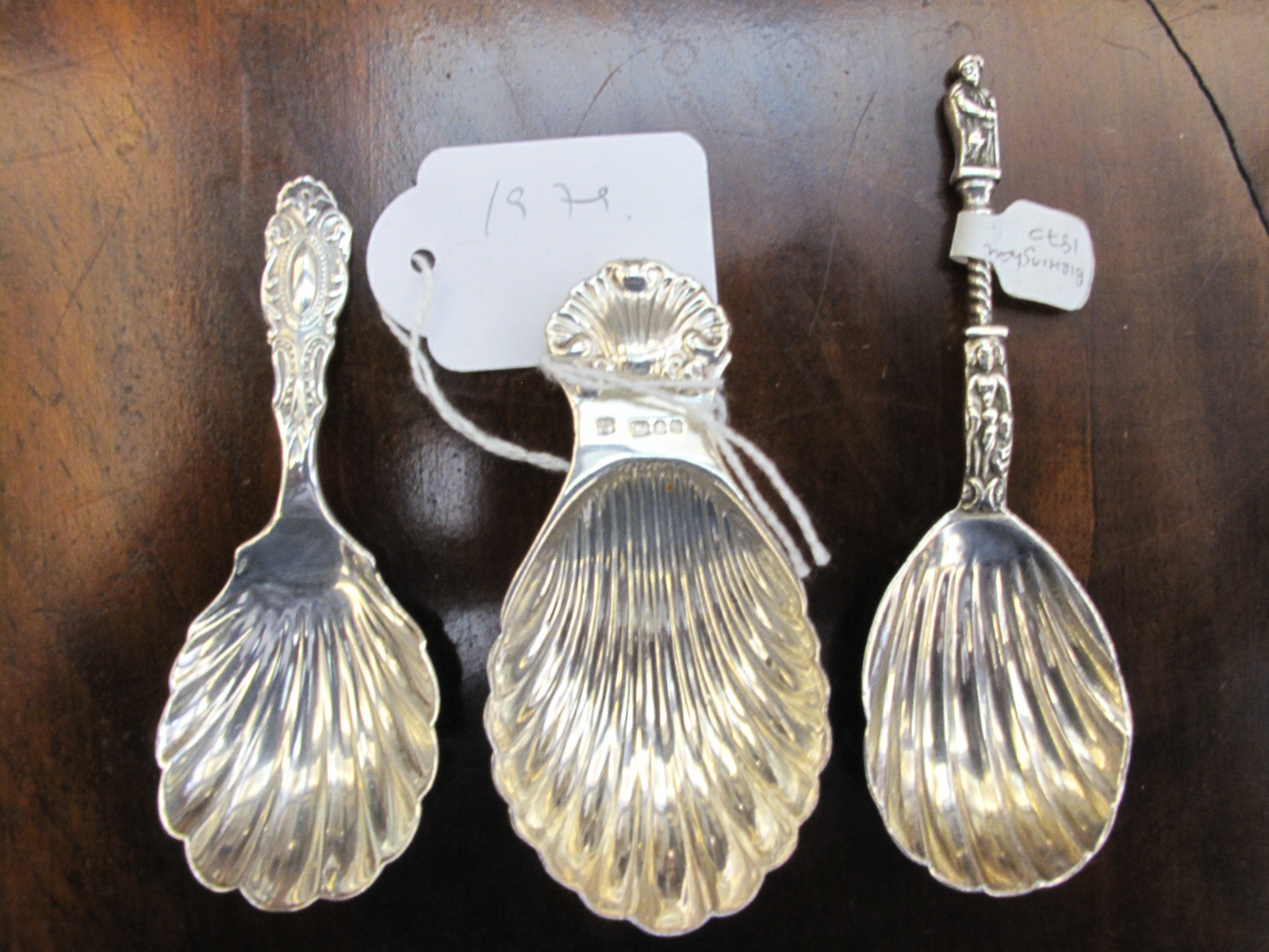 A COLLECTION OF THREE SILVER SHELL BOWL