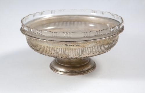 A SILVER CIRCULAR FRUIT BOWL, with opaqu