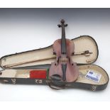 A CASED VIOLIN AND BOW   Label inside ma
