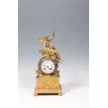 A FRENCH GILTMETAL FIGURAL MANTLE CLOCK,