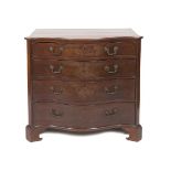 A GEORGE III MAHOGANY SERPENTINE CHEST,