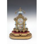 A FRENCH ORMOLU AND PORCELAIN MOUNTED MA