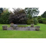 A MATCHED SET OF FOUR COMPOSITION, POSSIBLY COADESTONE, TERRACE URNS, 19th century, of tapering vase