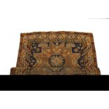 AN EARLY 20TH CENTURY LESHOL SHIRWAN RUG, the large navy rectangular field decorated with three