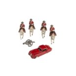 ***PLEASE NOTE: THESE TOYS DATE FROM THE 1940s/1950s***A SET OF TIMPO CAST LEAD FIGURES OF FOUR