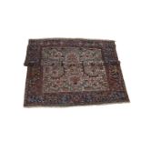 A SEMI ANTIQUE GEORAVAN CARPET, ORIGINATING NEAR HERIZ, the ivory ground with large stylised