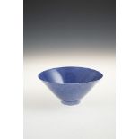 A CHINESE BLUE GROUND MONOCHROME BOWL, 19TH CENTURY, Qing dynasty, of flared circular form,