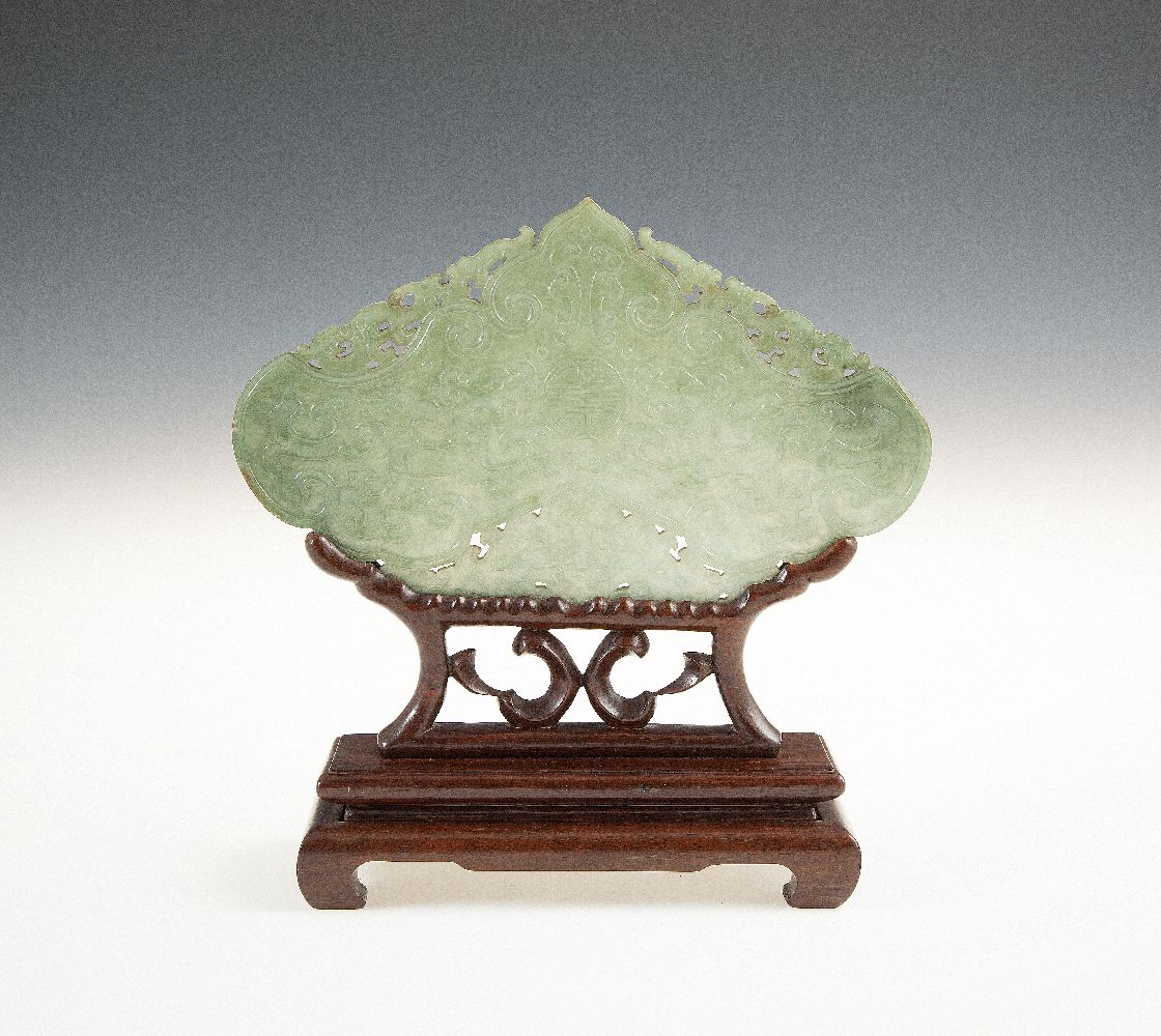 A CHINESE GREEN JADE ARCHAISTIC PANEL, 18th/19th century, Qing Dynasty, shaped as a musical chime,