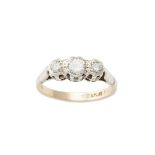 A diamond three-stone ring, composed of old round brilliant-cut diamonds, larger to center, within a