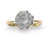 A diamond single-stone ring, composed of a round brilliant-cut diamond within an eight-claw