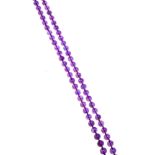 A collection of beaded necklaces, comprised of a knotted strand of amethyst beads; together with