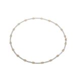 A 9 carat gold bi-coloured necklace, composed of alternating polished square yellow gold links and