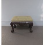 A Chippendale style mahogany footstool,