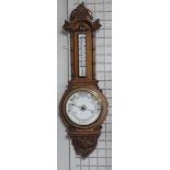 A Victorian oak aneroid barometer & ther