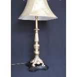 A Victorian style gilt metal table lamp