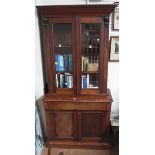 A late Victorian mahogany two door bookc