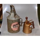 Two vintage oil cans