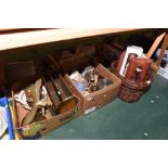 Two boxes and a wicker basket containing costume dolls, brass articles, satsuma wares