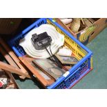 A box inc. a vintage Polaroid camera, photo frames etc
