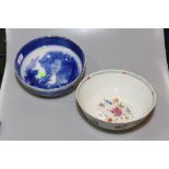 A Cantonese bowl decorated with flowers & foliage together with a blue and white transfer printed