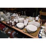 A vintage Poole "coffee and cream" partial dinner service including sauce boats, serving dishes,