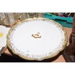 A 19th century Continental porcelain cabaret stand, painted with an armorial (a/f).