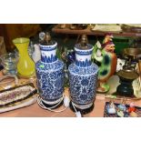 A pair of Chinese blue and white vases mounted as table lamps (drilled)