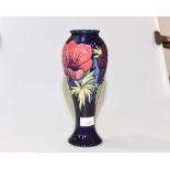 A William Moorcroft Anemone pattern slender baluster vase, bears factory and artist's marks for