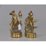 A pair of gilt bronze pirate ornaments, 21cm high