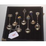 A group of seven silver collector spoons, each for a county of England, mark examples include London