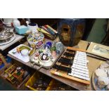 Two trays inc. glass paper weights, vintage badges, Poole pottery nut dish etc; tog. with a