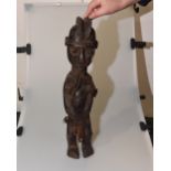 A West African tribal wooden carving/statue, possibly Yoruba. Height 55cm