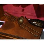 A Couesnon & Cie French trombone, with stamped makers marks