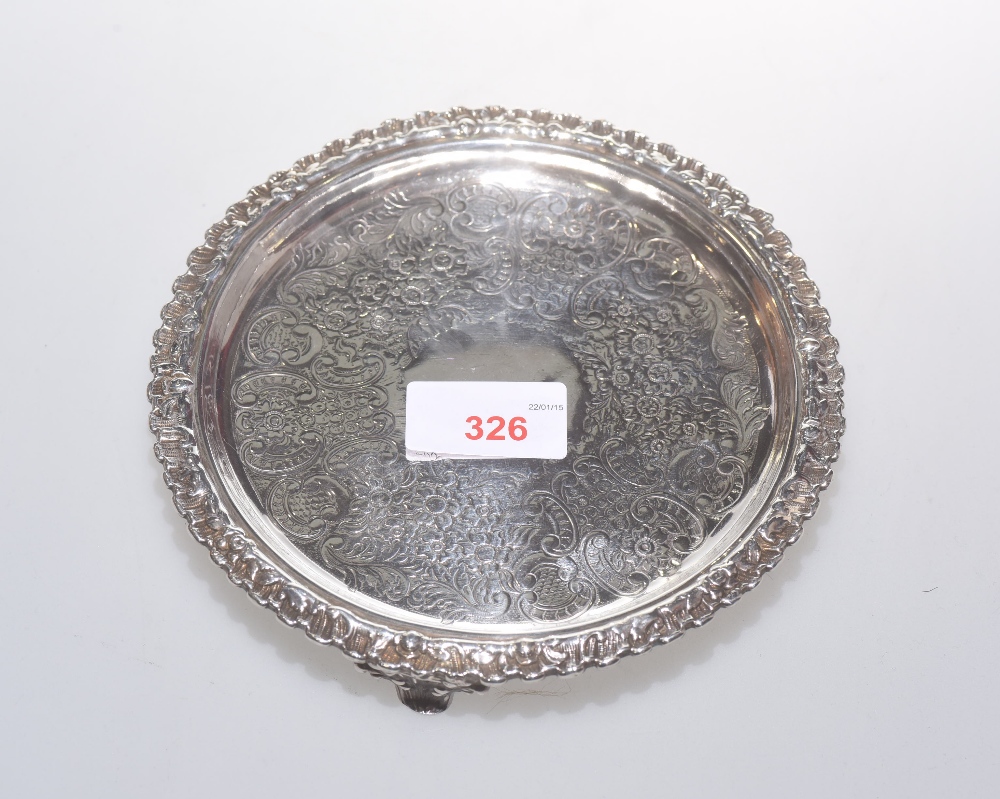 A George III silver footed dish, chased with scrolls and the rim cast with leaves, marked for