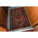 A SW Persian Belouch rug. 87x124cm